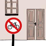 Vor einer Haustür steht ein Straßenschild. Auf dem Schild ist ein durchgestrichenes Fahrrad. Vor einer Haustür steht ein Straßenschild. Auf dem Schild ist ein durchgestrichenes Fahrrad.